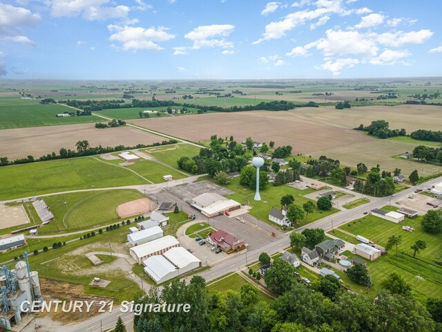 birds eye view of property featuring a rural view