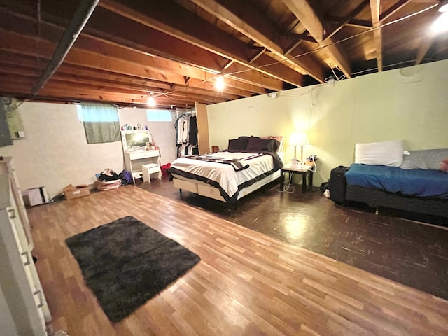 bedroom with wood-type flooring