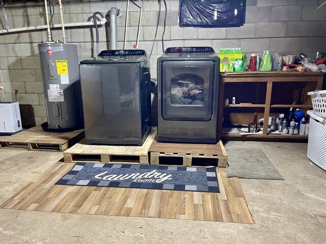 clothes washing area with electric water heater and washing machine and clothes dryer