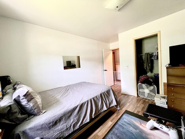 bedroom with light hardwood / wood-style flooring