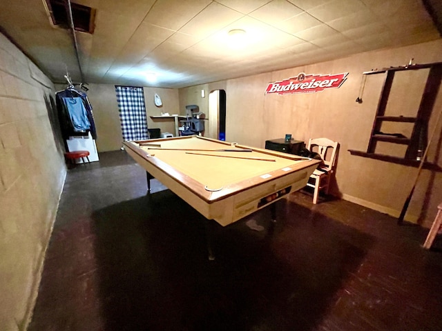 rec room featuring pool table and concrete flooring