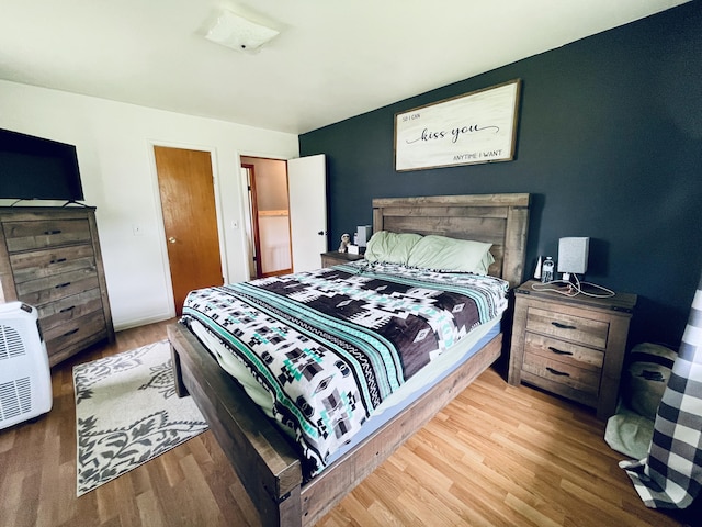 bedroom with light wood-type flooring