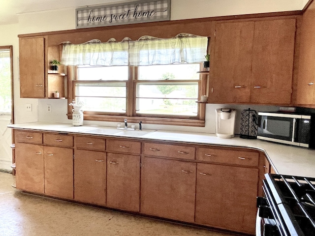 kitchen featuring stainless steel appliances and sink