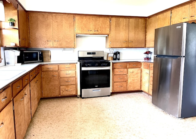 kitchen with stainless steel appliances and sink