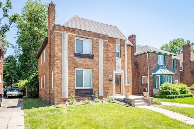 view of front facade featuring a front yard