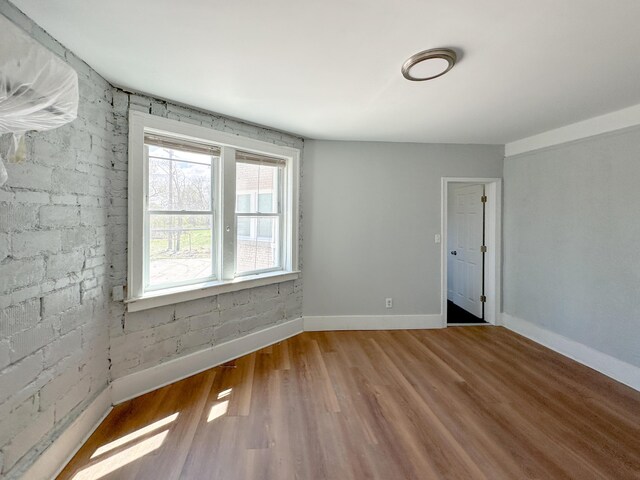 3737 Scovel Pl, Detroit, MI 48208 - unfurnished room with wood finished floors and baseboards