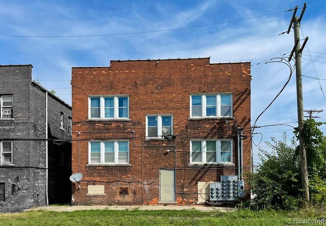 3737 Scovel Pl, Detroit, MI 48208 - rear view of property with brick siding