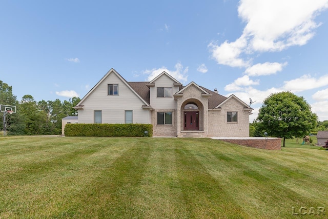 view of front property with a front lawn