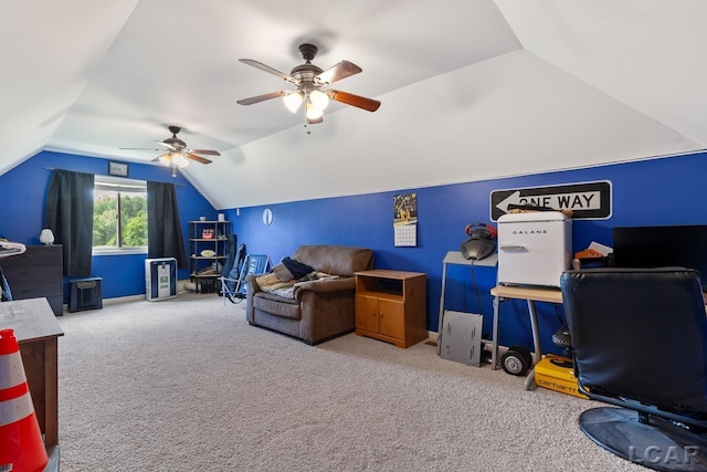 recreation room featuring ceiling fan, carpet floors, and lofted ceiling