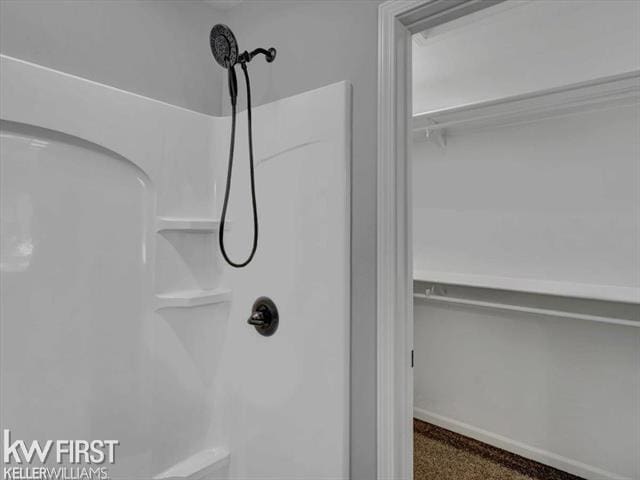 bathroom with a shower