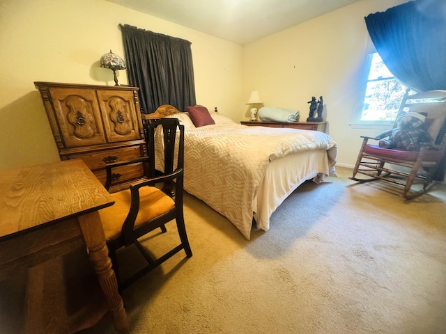 bedroom with light carpet