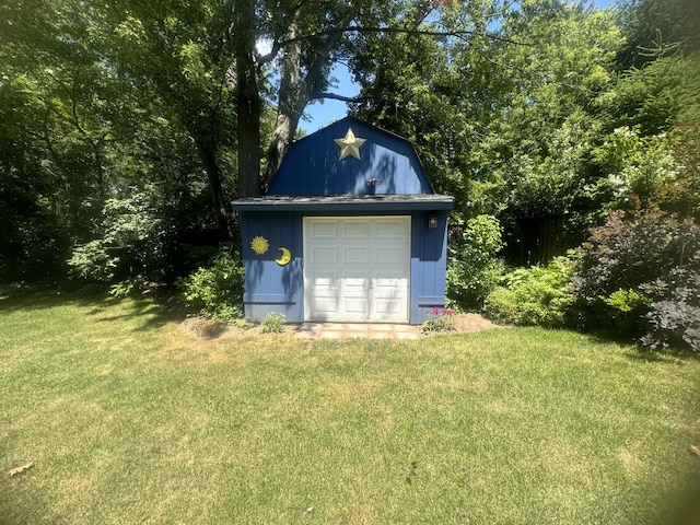 view of outbuilding featuring a yard