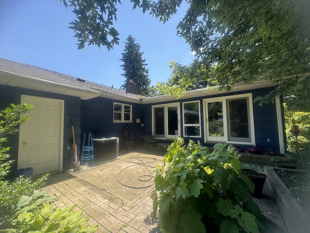 back of house featuring a patio area