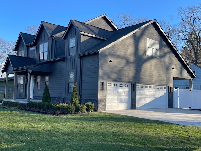 view of home's exterior featuring a yard and a garage