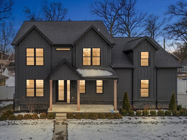 modern farmhouse style home featuring a porch