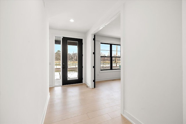 entryway with light wood-type flooring