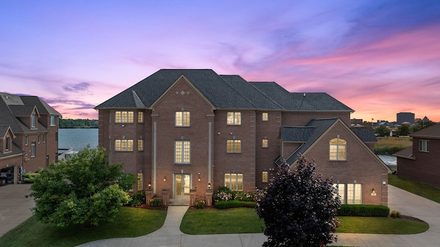 18 Sand Bar Ln, Detroit, MI 48214 - colonial house with brick siding and a front yard