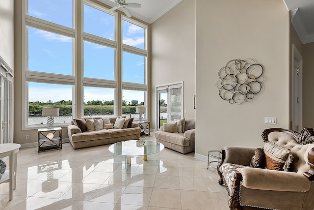 18 Sand Bar Ln, Detroit, MI 48214 - living room with ornamental molding, baseboards, a high ceiling, ceiling fan, and a water view