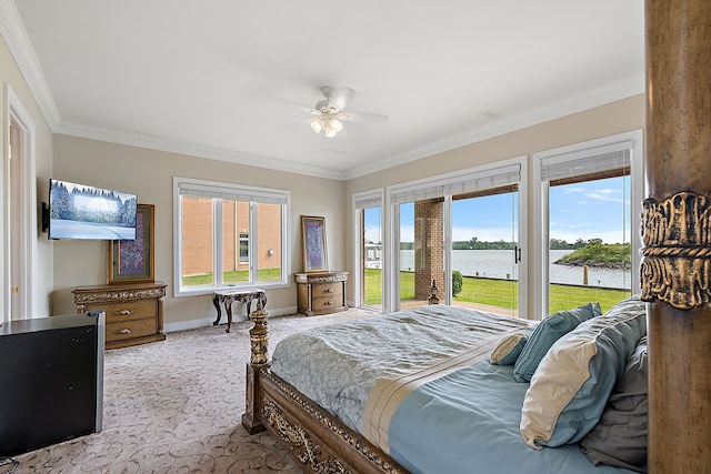 bedroom featuring access to exterior, ceiling fan, a water view, and ornamental molding