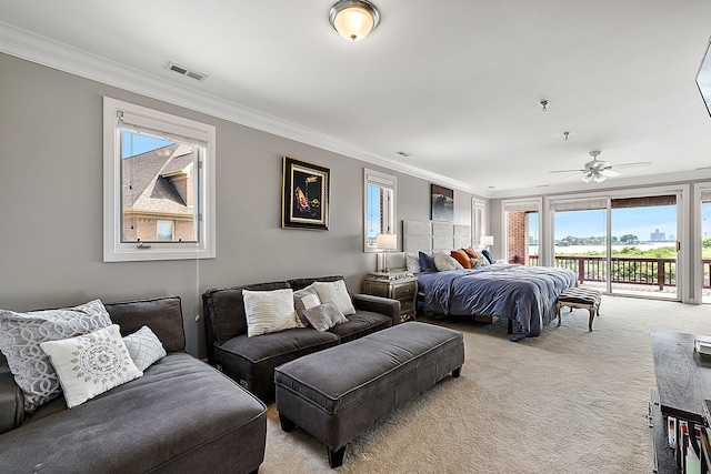 carpeted bedroom featuring access to exterior, ceiling fan, and ornamental molding