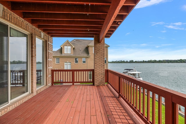 deck featuring a water view