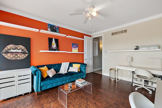 living room with crown molding, ceiling fan, and dark hardwood / wood-style floors