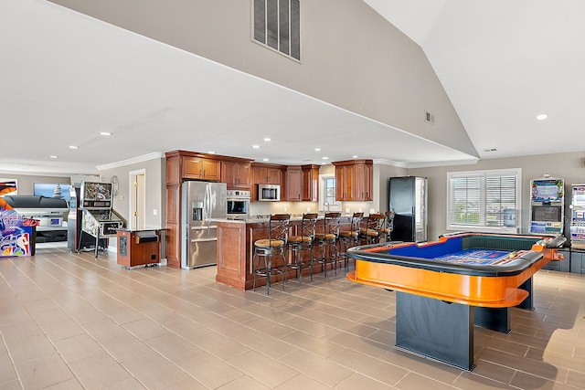 playroom with high vaulted ceiling, ornamental molding, and pool table