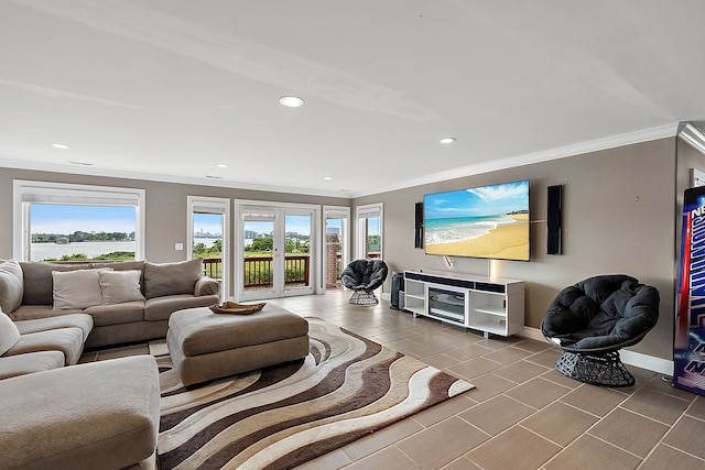 tiled living room featuring crown molding and french doors