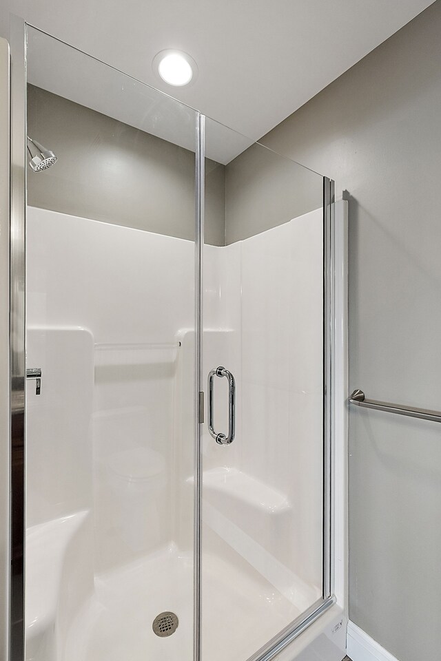 18 Sand Bar Ln, Detroit, MI 48214 - full bath featuring a stall shower and recessed lighting