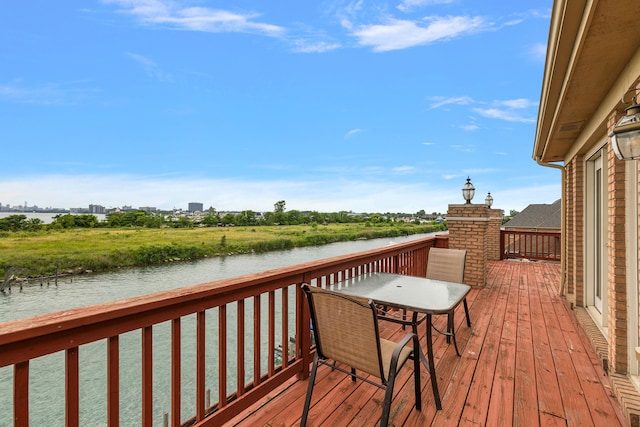 deck featuring a water view