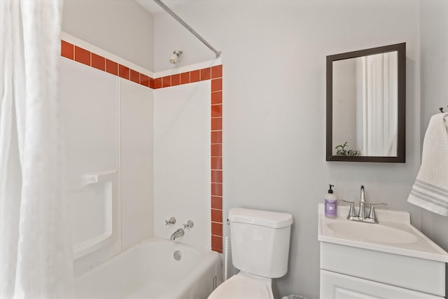 full bathroom with tiled shower / bath combo, toilet, and vanity