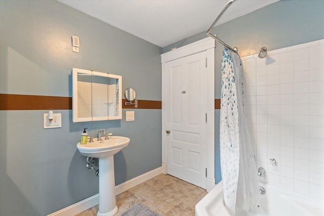 bathroom featuring shower / bath combination with curtain