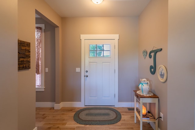 foyer entrance featuring light wood-type flooring