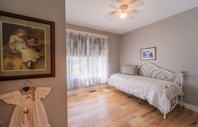 bedroom featuring ceiling fan and light wood-type flooring