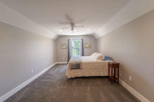 carpeted bedroom with ceiling fan and lofted ceiling