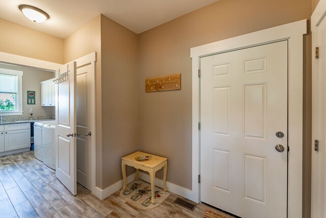 829 N Van Dyke Rd, Imlay City, MI 48444 - interior space featuring light wood finished floors and baseboards