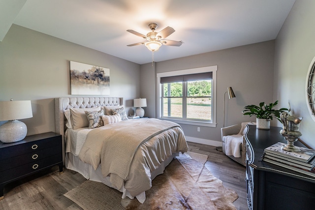 bedroom featuring ceiling fan and hardwood / wood-style flooring