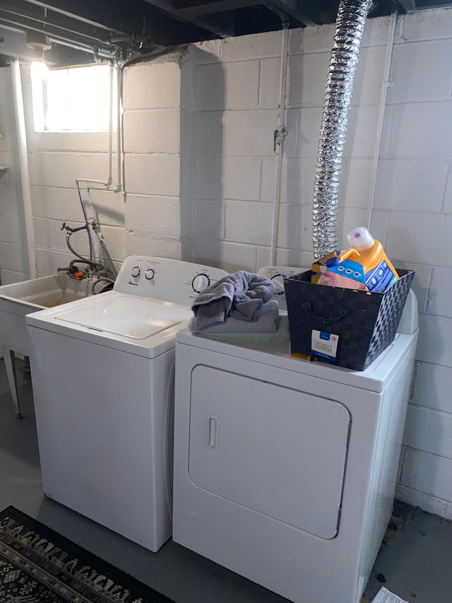 washroom with separate washer and dryer