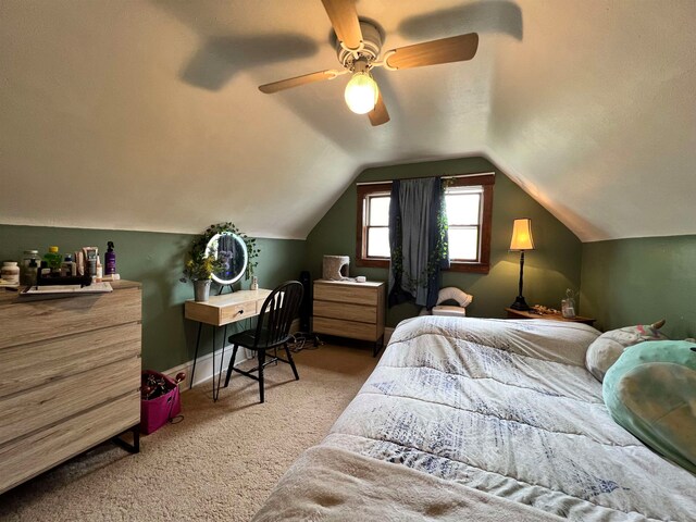 bedroom featuring carpet flooring, ceiling fan, and lofted ceiling