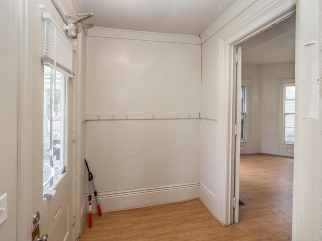 laundry room featuring light hardwood / wood-style floors