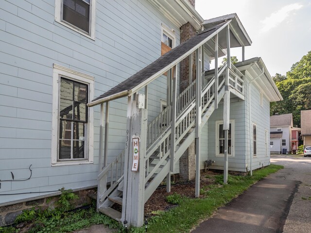 935 W Lovell St, Kalamazoo, MI 49007 - view of home's exterior featuring stairway