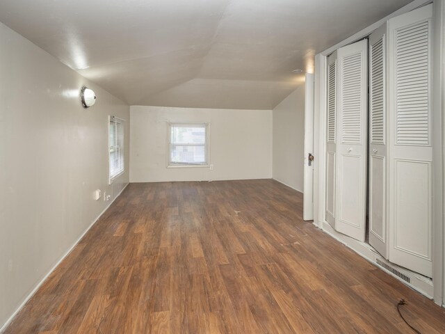 935 W Lovell St, Kalamazoo, MI 49007 - additional living space featuring wood finished floors and vaulted ceiling