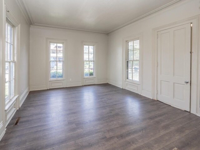 935 W Lovell St, Kalamazoo, MI 49007 - empty room featuring dark wood-type flooring and ornamental molding