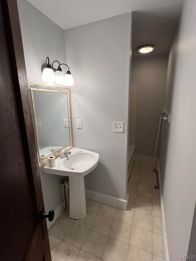 bathroom with tile patterned floors