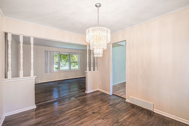 unfurnished dining area with a notable chandelier, dark hardwood / wood-style flooring, and ornamental molding