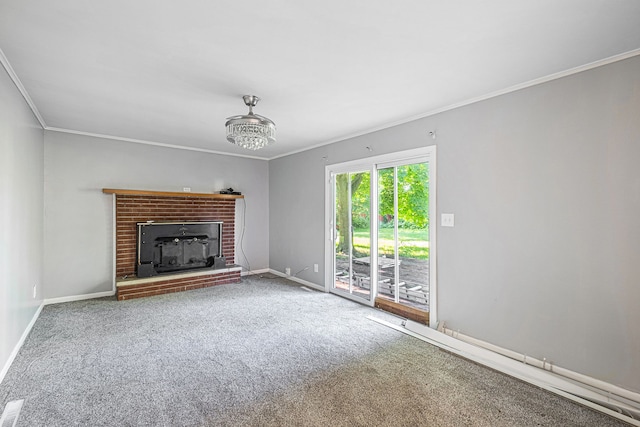 unfurnished living room featuring crown molding, a fireplace, and carpet floors