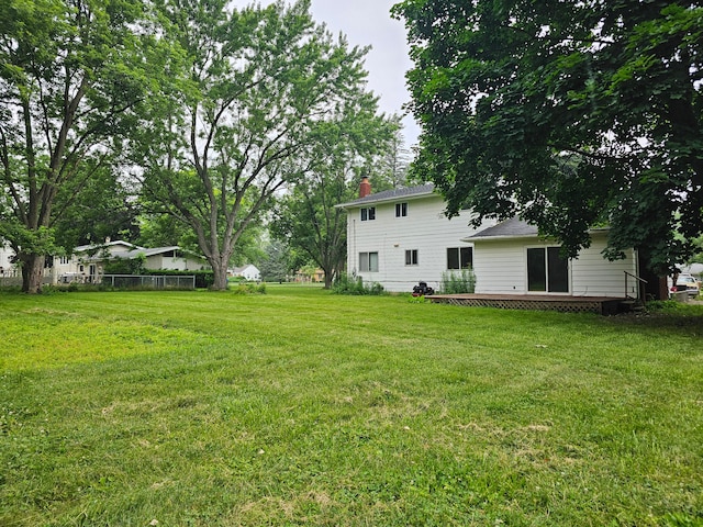 view of yard featuring a deck