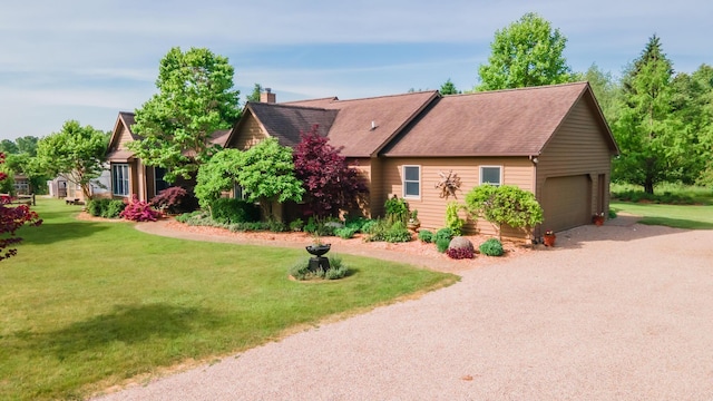 1477 E Hastings Lake Rd, Jonesville, MI 49250 - view of front of property featuring a chimney, a garage, a front lawn, and a shingled roof