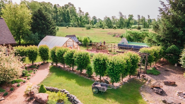 1477 E Hastings Lake Rd, Jonesville, MI 49250 - view of yard with an exterior structure, an outbuilding, and a view of rural / pastoral area