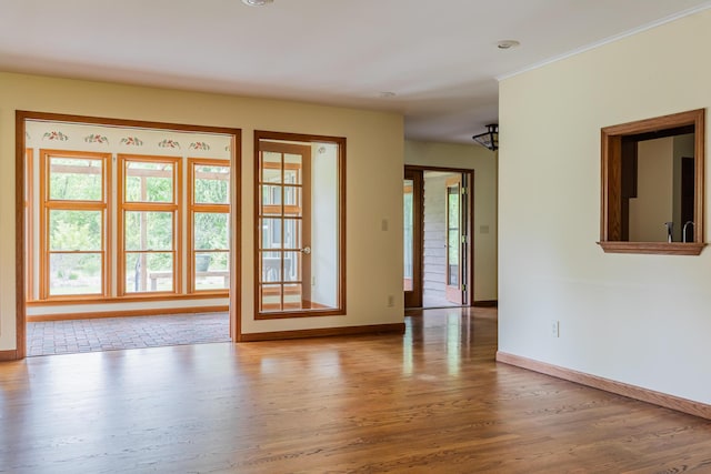 1477 E Hastings Lake Rd, Jonesville, MI 49250 - unfurnished room featuring baseboards and wood finished floors